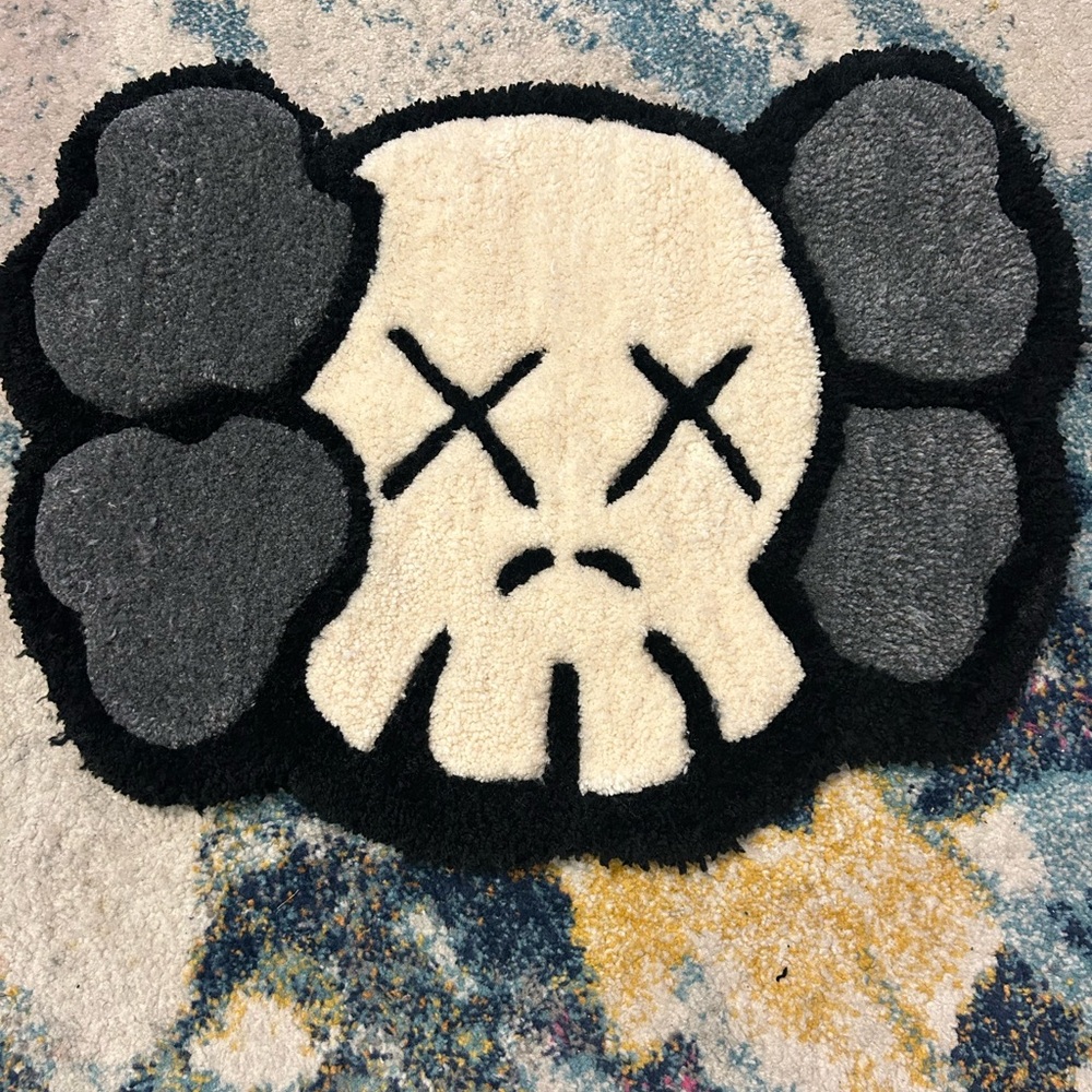 Hand-tufted art rug featuring a bold cartoon-inspired character